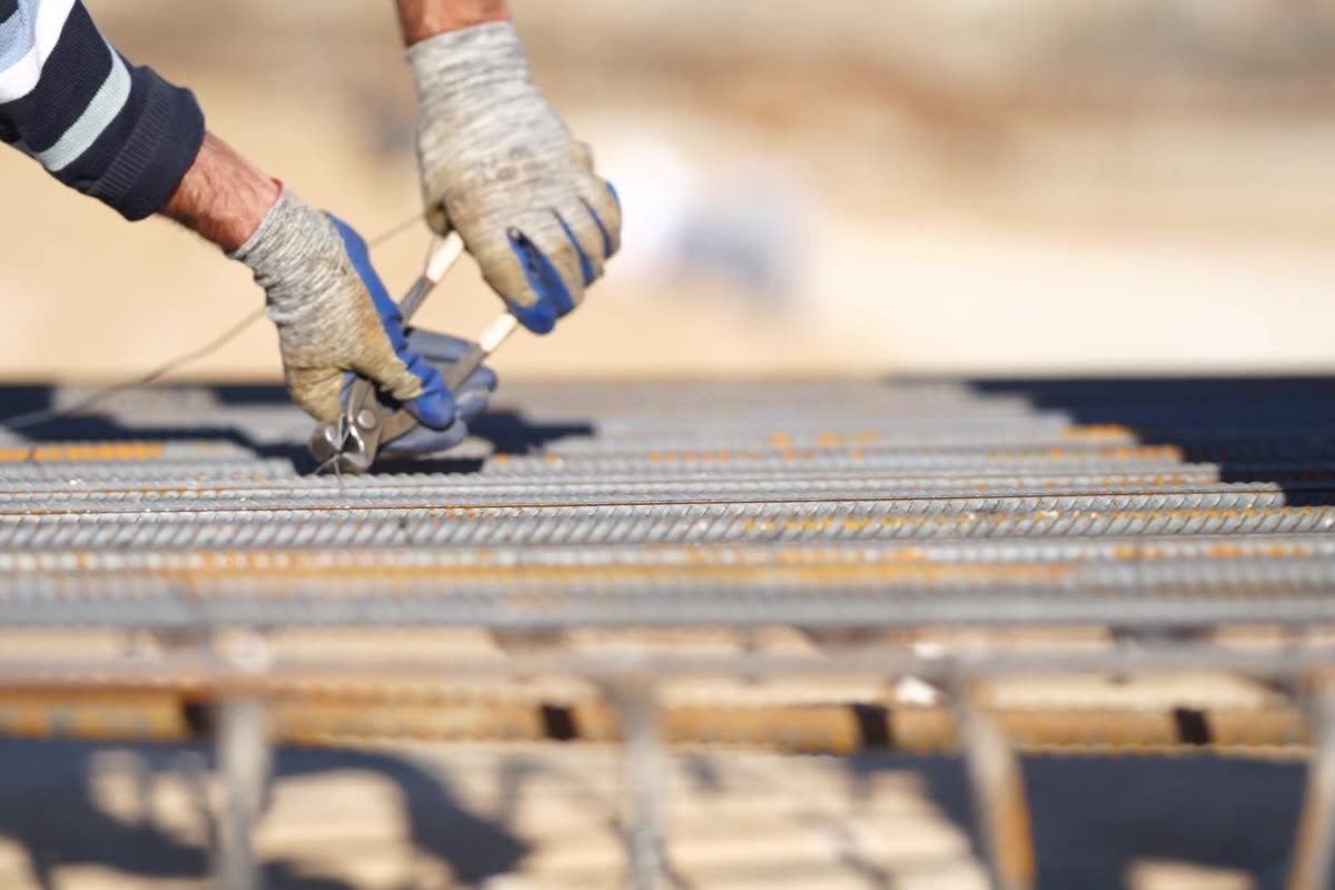 Reinforcing mesh on bar chairs inside the formwork, Raymond Terrace